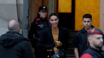 Spanish model and wife of Dani Alves, Joana Sanz (C) reacts as she leaves on the second day of the Brazilian footballer trial at the High Court of Justice of Catalonia in Barcelona, on February 6, 2024. Brazilian footballer Dani Alves, a former star at Barca and PSG, goes on trial in Barcelona accused of raping a woman in a local nightclub. Prosecutors are asking for a nine-year prison sentence, followed by 10 years of conditional liberty. They are also asking he pay 150,000 euros ($162,000) in compensation to the woman. (Photo by LLUIS GENE / AFP)