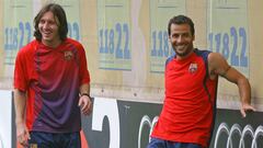 Ludovic Giuly y Leo Messi, durante un entrenamiento del Barcelona de la temporada 2006-2007.