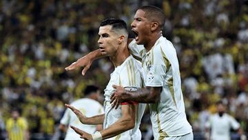 Soccer Football - Saudi Pro League - Al Ittihad v Al Nassr - King Abdullah Sport City, Jeddah, Saudi Arabia - December 6, 2024 Al Nassr's Cristiano Ronaldo celebrates scoring their first goal with Angelo Gabriel REUTERS/Stringer