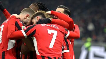 Joao Felix celebrates his goal 3-1 with Santiago Gimenez of AC Milan during the Quarter Final - Coppa Italia match between AC Milan and AS Roma at Stadio Giuseppe Meazza on February 05, 2025 in Milan, Italy.
