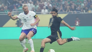 Jul 6, 2025; Houston, Texas, USA; Mexico forward Raul Jimenez (9) kicks a goal past United States defender Tim Ream (13) in the first half during the 2025 Gold Cup Final at NRG Stadium. Mandatory Credit: Troy Taormina-Imagn Images