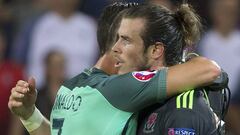 Cristiano Ronaldo and Gareth Bale embrace after the game.