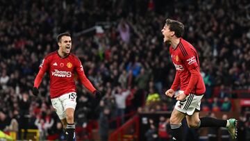 Manchester United's Swedish defender #02 Victor Lindelof (R) celebrates with teammates after scoring his team first goal during the English Premier League football match between Manchester United and Luton Town at Old Trafford in Manchester, north west England, on November 11, 2023. (Photo by Oli SCARFF / AFP) / RESTRICTED TO EDITORIAL USE. No use with unauthorized audio, video, data, fixture lists, club/league logos or 'live' services. Online in-match use limited to 120 images. An additional 40 images may be used in extra time. No video emulation. Social media in-match use limited to 120 images. An additional 40 images may be used in extra time. No use in betting publications, games or single club/league/player publications. / 