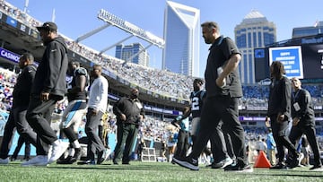 Head coach Matt Rhule of the Carolina Panthers walks off the field at halftime against the Minnesota Vikings at Bank of America Stadium on October 17, 2021, in Charlotte, North Carolina. 