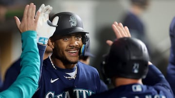 SEATTLE, WASHINGTON - SEPTEMBER 26: Julio Rodriguez #44 celebrates a run with Ty France #23 of the Seattle Mariners during the third inning against the Houston Astros at T-Mobile Park on September 26, 2023 in Seattle, Washington.   Steph Chambers/Getty Images/AFP (Photo by Steph Chambers / GETTY IMAGES NORTH AMERICA / Getty Images via AFP)