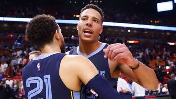 MIAMI, FLORIDA - DECEMBER 06: Tyus Jones #21 of the Memphis Grizzlies celebrates with Desmond Bane #22 after defeating the Miami Heat 105-90 at FTX Arena on December 06, 2021 in Miami, Florida. NOTE TO USER: User expressly acknowledges and agrees that, by downloading and or using this photograph, User is consenting to the terms and conditions of the Getty Images License Agreement. Michael Reaves/Getty Images/AFP
== FOR NEWSPAPERS, INTERNET, TELCOS & TELEVISION USE ONLY ==