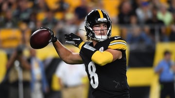 Kenny Pickett of the Pittsburgh Steelers drops back to pass in the fourth quarter during a preseason game against the Seattle Seahawks at Acrisure Stadium on August 13, 2022 in Pittsburgh, Pennsylvania.