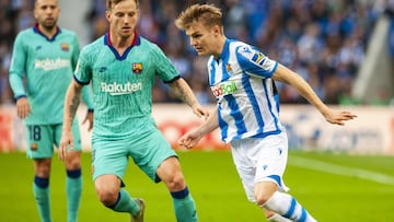 Martin Odegaard in action against Barcelona. 