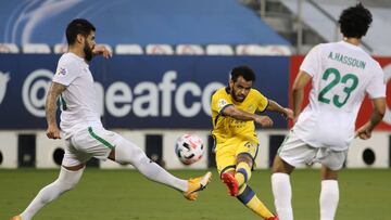 Nassr&#039;s midfielder Abdulfattah Asiri (C) attempts a shot during the AFC Champions League quarter-finals match between Saudi&#039;s Al-Nassr and Saudi&#039;s Al-Ahli on September 30, 2020, at the Jassim Bin Hamad Stadium in the Qatari capital Doha. (P