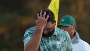 Golf - The Masters - Augusta National Golf Club, Augusta, Georgia, U.S. - April 12, 2024 Spain's Jon Rahm reacts as he walks off the green on the 18th hole after completing his second round REUTERS/Mike Segar