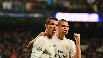 Cristiano Ronaldo (L) of Real Madrid celebrates after scoring his team's second goal with Pepe (R) during the UEFA Champions League quarter final second leg match between Real Madrid and VfL Wolfsburg at Estadio Santiago Bernabeu on April 12, 2016 in Madrid, Spain.