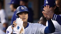 LOS ANGELES, CALIFORNIA - APRIL 15: Shohei Ohtani #17 of the Los Angeles Dodgers celebrates his run in the dugout during the first inning against the Washington Nationals at Dodger Stadium on April 15, 2024 in Los Angeles, California. All players are wearing the number 42 in honor of Jackie Robinson Day.   Harry How/Getty Images/AFP (Photo by Harry How / GETTY IMAGES NORTH AMERICA / Getty Images via AFP)