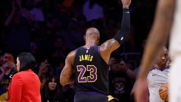 LOS ANGELES, CALIFORNIA - NOVEMBER 21: LeBron James #23 of the Los Angeles Lakers acknowledges cheers from the crowd after scoring his 39,000th career point during the first half against the Utah Jazz during an NBA In-Season Tournament game at Crypto.com Arena on November 21, 2023 in Los Angeles, California. NOTE TO USER: User expressly acknowledges and agrees that, by downloading and or using this photograph, User is consenting to the terms and conditions of the Getty Images License Agreement.   Kevork Djansezian/Getty Images/AFP (Photo by KEVORK DJANSEZIAN / GETTY IMAGES NORTH AMERICA / Getty Images via AFP)