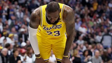 DENVER, COLORADO - APRIL 29: LeBron James #23 of the Los Angeles Lakers gathers himself after taking a hard hit while playing the Denver Nuggets in the third quarter during game five of the Western Conference First Round Playoffs at Ball Arena on April 29, 2024 in Denver, Colorado. NOTE TO USER: User expressly acknowledges and agrees that, by downloading and or using this photograph, User is consenting to the terms and conditions of the Getty Images License Agreement. Matthew Stockman/Getty Images/AFP (Photo by MATTHEW STOCKMAN / GETTY IMAGES NORTH AMERICA / Getty Images via AFP)