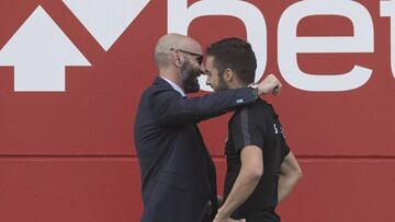 Monchi y Sarabia.