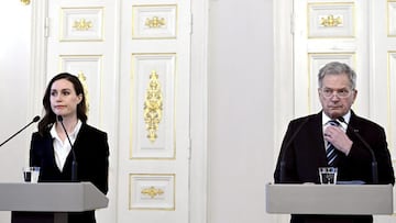 Finland&#039;s President Sauli NiinistxF6 (R) and Finland&#039;s Prime Minister Sanna Marin address a press conference on Russia&#039;s invasion of Ukraine in Helsinki, Finland, on February 24, 2022. - Russia invaded Ukraine early February 24 despite week