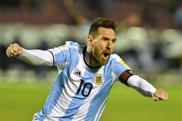Argentina's Lionel Messi celebrates after scoring against Ecuador during their 2018 World Cup qualifier football match in Quito, on October 10, 2017