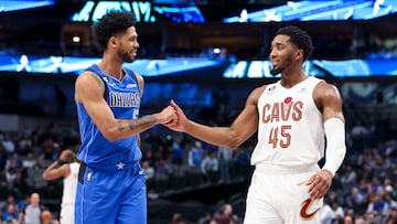 Dec 14, 2022; Dallas, Texas, USA;  Dallas Mavericks point guard Tyler Dorsey shakes hands with Cleveland Cavaliers guard Donovan Mitchell (45) during the fourth quarter at American Airlines Center. Mandatory Credit: Kevin Jairaj-USA TODAY Sports