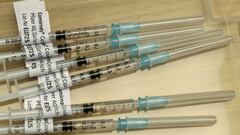 FILE PHOTO: Syringes containing Pfizer-BioNTech COVID-19 vaccine are seen at the Impfzentrum Basel Stadt vaccination center at the Congress Center of the Messe Basel fairground, as the spread of the coronavirus disease (COVID-19) continues, in Basel, Swit