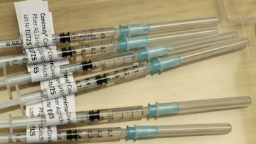 FILE PHOTO: Syringes containing Pfizer-BioNTech COVID-19 vaccine are seen at the Impfzentrum Basel Stadt vaccination center at the Congress Center of the Messe Basel fairground, as the spread of the coronavirus disease (COVID-19) continues, in Basel, Swit