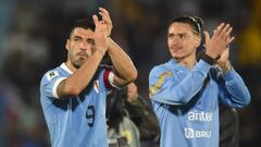 Uruguay's forward Luis Suarez (L) and Uruguay's forward Darwin Nunez acknowledge the crowd at the end of the 2026 FIFA World Cup South American qualification football match between Uruguay and Bolivia at the Centenario Stadium in Montevideo on November 21, 2023. (Photo by DANTE FERNANDEZ / AFP)