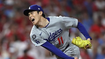 Oct 4, 2025; Philadelphia, Pennsylvania, USA; Los Angeles Dodgers pitcher Roki Sasaki (11) pitches against the Philadelphia Phillies in the ninth inning during game one of the NLDS round for the 2025 MLB playoffs at Citizens Bank Park. Mandatory Credit: Bill Streicher-Imagn Images