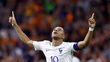 France's forward Kylian Mbapp� celebrates after scoring his team's second goal during the Euro 2024 qualifying football match between the Netherlands and France at the Johan Cruijff ArenA in Amsterdam on October 13, 2023. (Photo by KENZO TRIBOUILLARD / AFP)