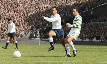 Spurs striker Jimmy Greaves next to John Clark of Celtic during a friendly match at Hampden Park between Tottenham Hotspur and Celtic on August 7, 1967 in Glasgow, Scotland.