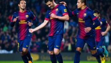 ALEGRÍA Y TRISTEZA. Villa cuajó un partido sensacional. En la imagen celebra uno de sus dos goles en la primera parte. En la segunda, en cambio, se fue con molestias.