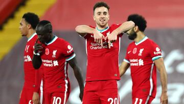 LIVERPOOL, ENGLAND - OCTOBER 31: Diogo Jota of Liverpool celebrates scoring his teams second goal during the Premier League match between Liverpool and West Ham United at Anfield on October 31, 2020 in Liverpool, England. Sporting stadiums around the UK r