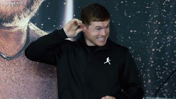 Mexican boxer Saul "Canelo" Alvarez gestures during a press conference to present his fight against British boxer John Ryder (out of frame) on May 6, in Guadalajara, Jalisco state, Mexico, on May 3, 2023. (Photo by ULISES RUIZ / AFP)