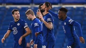 Chelsea's French striker Olivier Giroud celebrates scoring the opening goal during the English Premier League football match between Chelsea and Newcastle United at Stamford Bridge in London on February 15, 2021. (Photo by Mike Hewitt / POOL / AFP)
