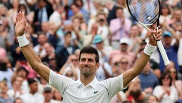 Serbia's Novak Djokovic celebrates beating South Korea's Kwon Soon-woo after their men's singles tennis match on the first day of the 2022 Wimbledon Championships at The All England Tennis Club in Wimbledon, southwest London, on June 27, 2022. (Photo by Adrian DENNIS / AFP) / RESTRICTED TO EDITORIAL USE