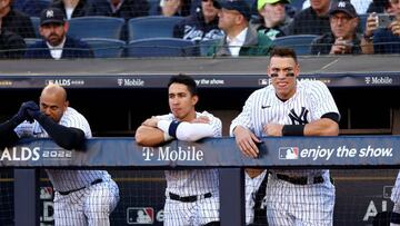 NEW YORK, NEW YORK - OCTOBER 18: Aaron Hicks #31, Oswaldo Cabrera #95 and Aaron Judge #99 of the New York Yankees look on from the dugout during the first inning against the Cleveland Guardians in game five of the American League Division Series at Yankee Stadium on October 18, 2022 in New York, New York. (Photo by Elsa/Getty Images)