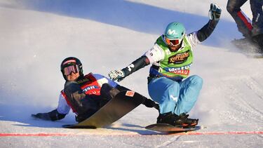 FIS Freestyle Ski Cross and Snowboard Cross World Championships - Idre Fjall, Sweden - February 11, 2021 Spain's Lucas Eguibar crosses the line to win the men's big final at the Snowboard Cross World Championships alongside Austria's Alessandro Haemmerle