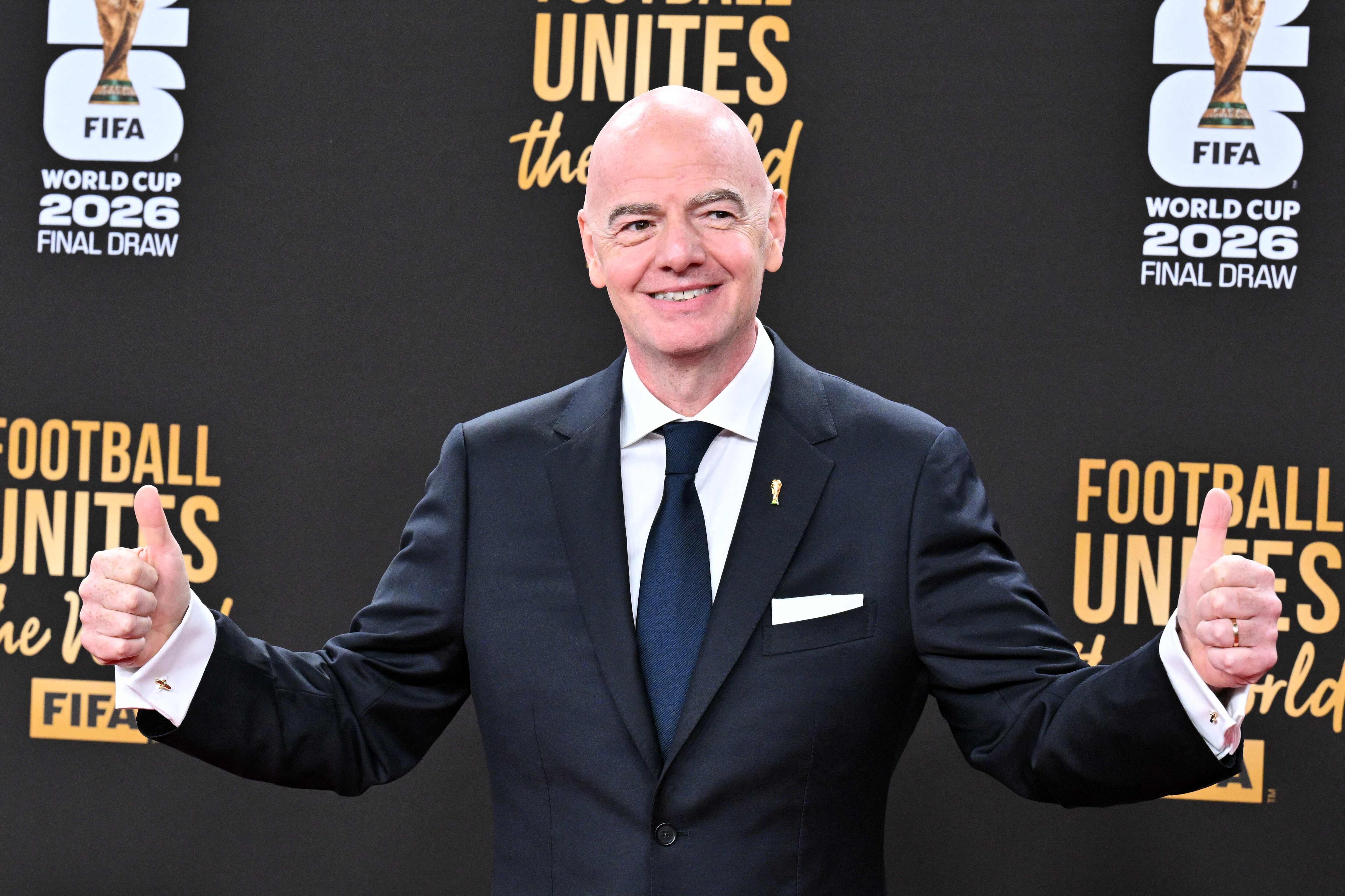 FIFA President Gianni Infantino poses on the red carpet upon arrival to attend the draw for the 2026 FIFA Football World Cup taking place in the US, Canada and Mexico, at the Kennedy Center, in Washington, DC, on December 5, 2025. (Photo by Roberto SCHMIDT / AFP)