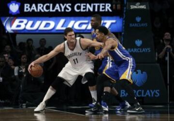 Brook López y Shaun Livinston.