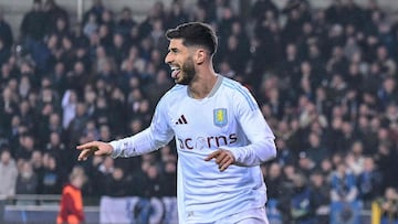 Aston Villa's Spanish forward #21 Marco Asensio (C) celebrates after Club Brugge's Belgian defender #44 Brandon Mechele (down, L) scored an own goal during the UEFA Champions League round of 16 first leg football match between Club Brugge KV and Aston Villa FC at the Jan Breydel Stadium in Bruges, on March 4, 2025. (Photo by NICOLAS TUCAT / AFP)