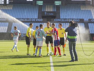 Captains Hugo Mallo and Gabi come together for the coin toss.