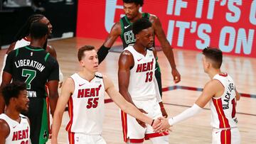 &Omega;Sep 17, 2020; Lake Buena Vista, Florida, USA; Miami Heat guard Duncan Robinson (55) is high fives guard Tyler Herro (14) after a play against the Boston Celtics during the third quarter in game two of the Eastern Conference Finals of the 2020 NBA Playoffs at ESPN Wide World of Sports Complex. Mandatory Credit: Kim Klement-USA TODAY Sports