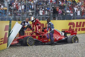 HOCKENHEIM, GERMANY - JULY 22: Sebastian Vettel of Germany and Ferrari climbs from the car after crashing during the Formula One Grand Prix of Germany at Hockenheimring on July 22, 2018 in Hockenheim, Germany. (Photo by Getty Images/Getty Images)  PUBLICA