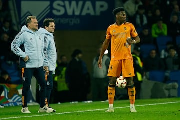 Real Madrid's French midfielder #14 Aurelien Tchouameni holds the ball between his legs during the Spanish Copa del Rey (King's Cup) semi-final first leg football match between Real Sociedad and Real Madrid CF at the Anoeta stadium in San Sebastian, on February 26, 2025. (Photo by ANDER GILLENEA / AFP)