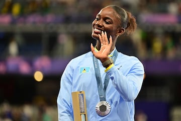 Silver medallist St Lucia's Julien Alfred celebrates on the podium.