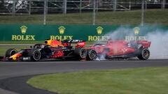 NORTHAMPTON, ENGLAND - JULY 14: Max Verstappen of the Netherlands driving the (33) Aston Martin Red Bull Racing RB15 and Sebastian Vettel of Germany driving the (5) Scuderia Ferrari SF90 crash during the F1 Grand Prix of Great Britain at Silverstone on July 14, 2019 in Northampton, England. (Photo by Charles Coates/Getty Images)