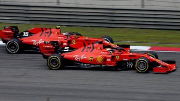 SHANGHAI, CHINA - APRIL 14: Sebastian Vettel of Germany driving the (5) Scuderia Ferrari SF90 leads Charles Leclerc of Monaco driving the (16) Scuderia Ferrari SF90 on track during the F1 Grand Prix of China at Shanghai International Circuit on April 14, 2019 in Shanghai, China. (Photo by Charles Coates/Getty Images)