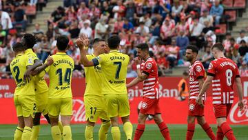 Villarreal's Spanish forward Gerard Moreno (C) celebrates scoring his team's second goal during the Spanish league football match between Girona FC and Villarreal CF at the Montilivi stadium in Girona on May 20, 2023. (Photo by Josep LAGO / AFP)