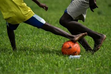 Young boys play football in Yerry Mina's hometown Guachené.