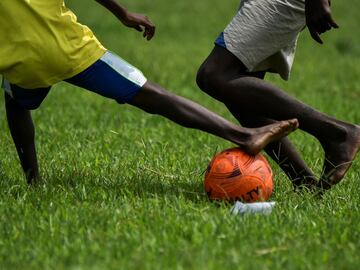 Young boys play football in Yerry Mina's hometown Guachené.