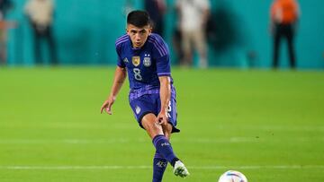 (FILES) This file photo taken on September 23, 2022 shows Argentina's midfielder Thiago Almada kicking the ball during the international friendly match between Honduras and Argentina at Hard Rock Stadium in Miami Gardens, Florida. (Photo by Eric Espada / GETTY IMAGES NORTH AMERICA / AFP)