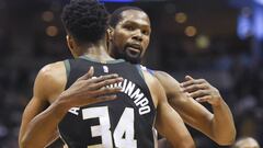 Jan 12, 2018; Milwaukee, WI, USA; Golden State Warriors forward Kevin Durant (35) hugs Milwaukee Bucks forward Giannis Antetokounmpo (34) after the Warriors beat the Bucks at BMO Harris Bradley Center. Mandatory Credit: Benny Sieu-USA TODAY Sports